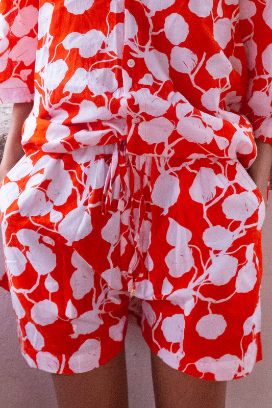 CARROT ORANGE FLORAL SHORTS