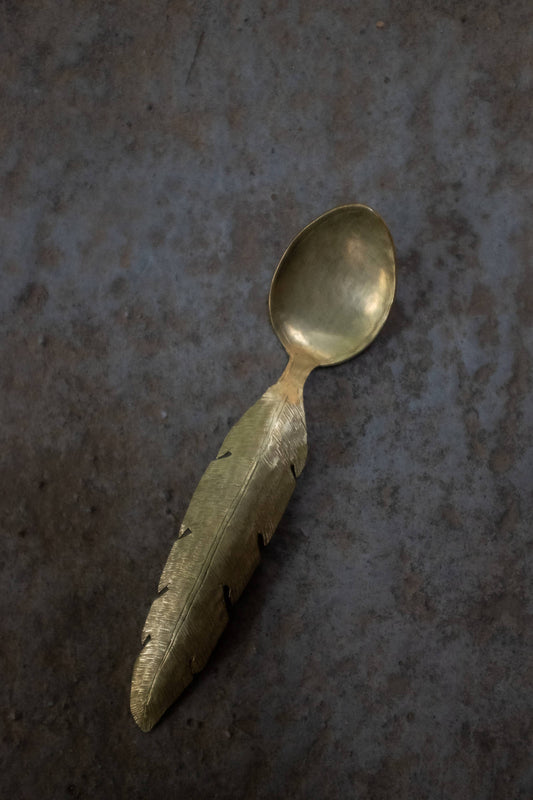 SPOON WITH FEATHER DESIGN