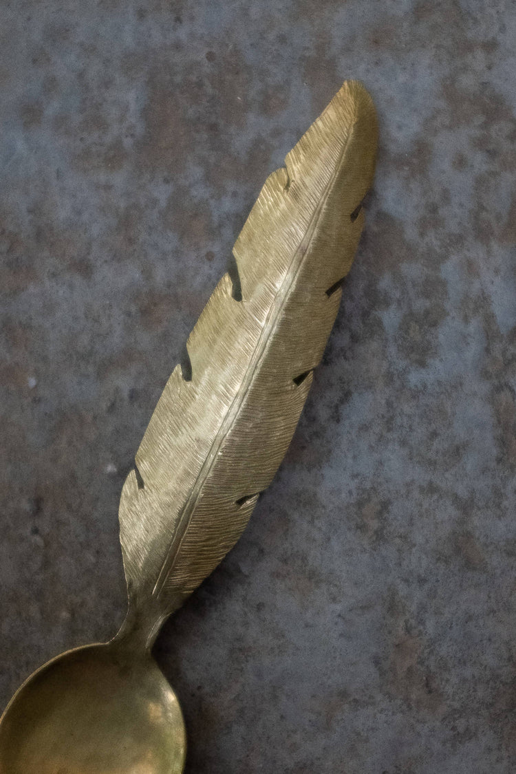 SPOON WITH FEATHER DESIGN